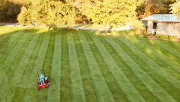 Mowing for S.C. Landscaping in Franklin, NH