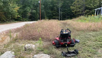 Mowing for S.C. Landscaping in Franklin, NH