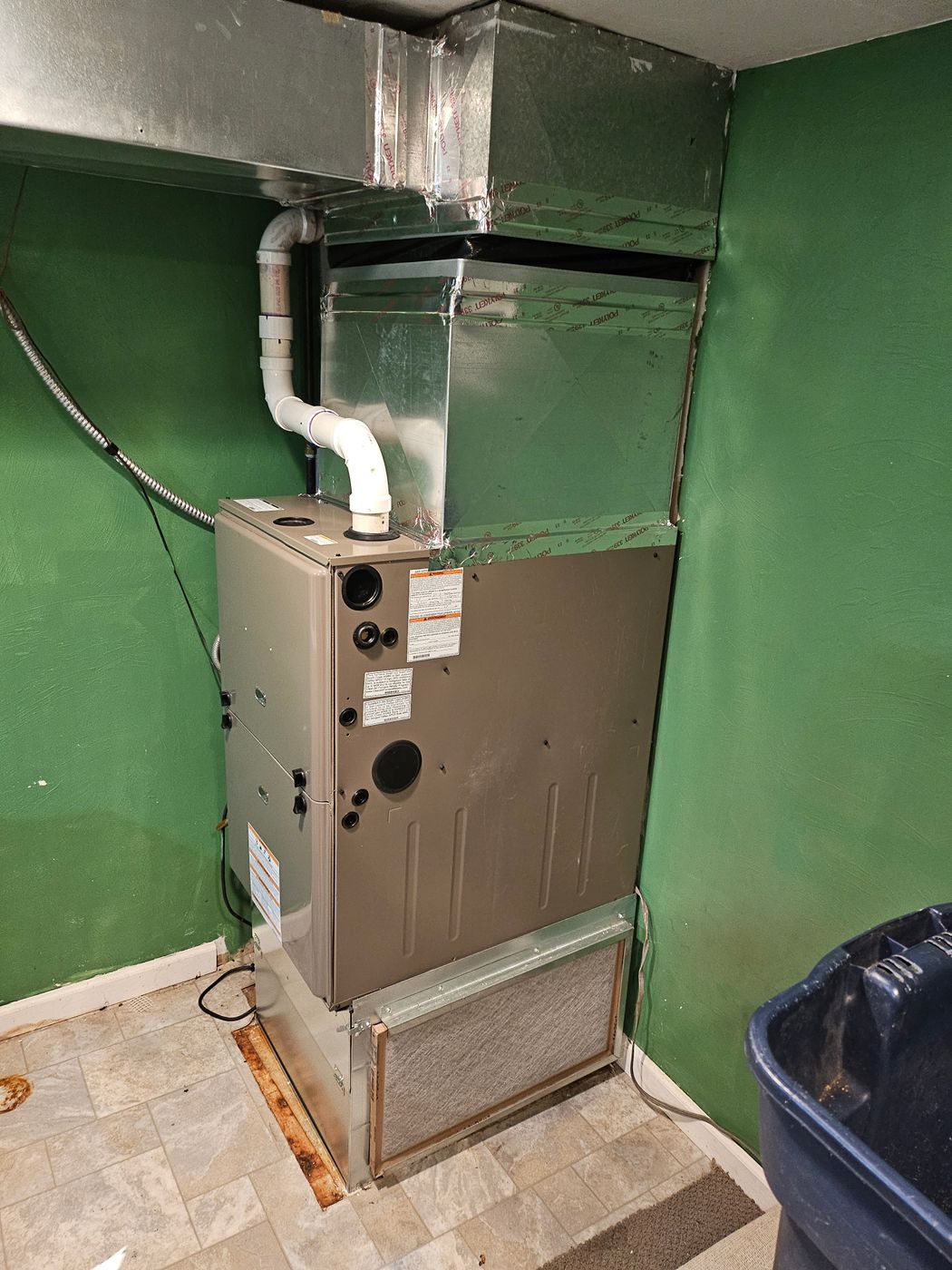 Newly installed furnace with sealed plenum and filter box