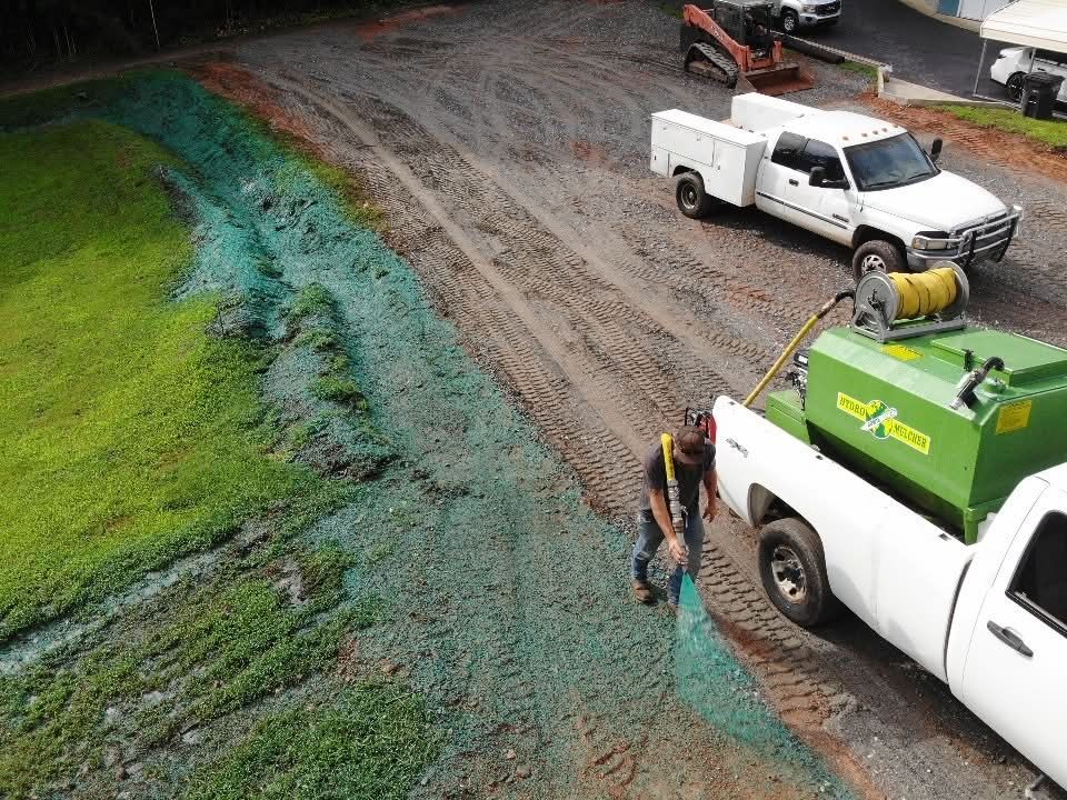 The 4 G&rsquo;s truck and hydro mulcher on a job
