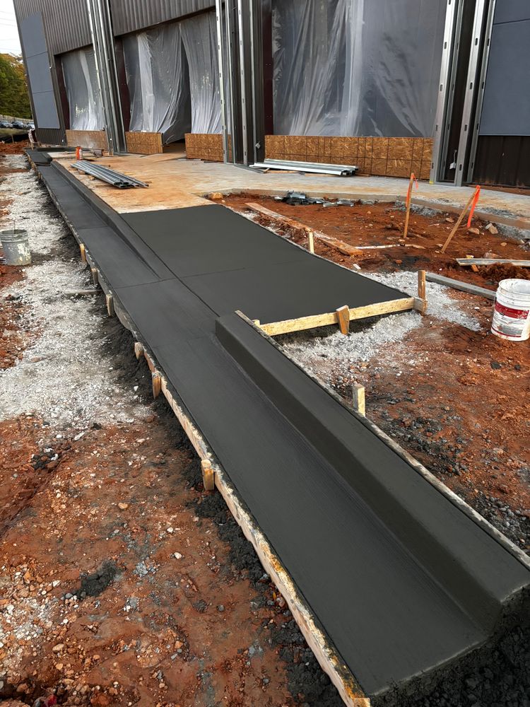 Formed and poured concrete channel section on a civil job site