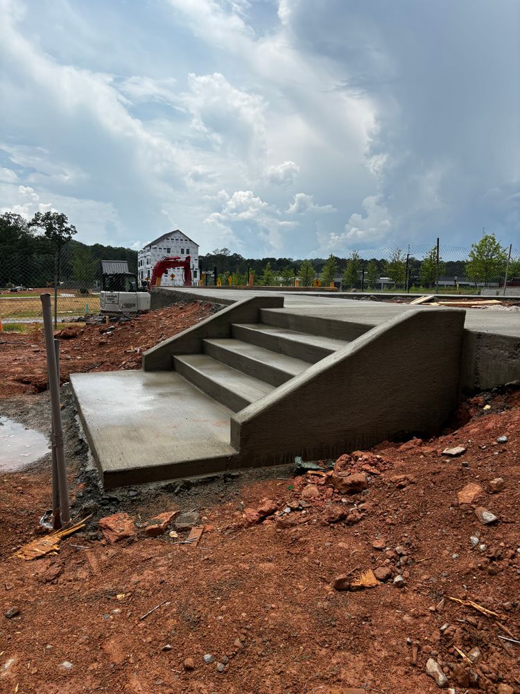 Cast in place concrete steps with retaining wall