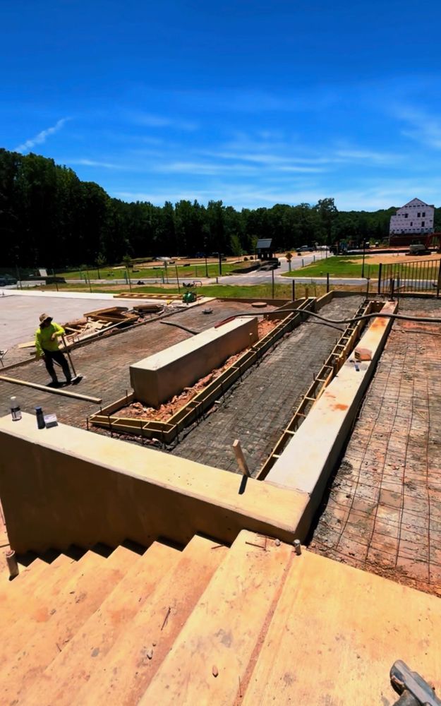 Large formed concrete steps and retaining structure under construction