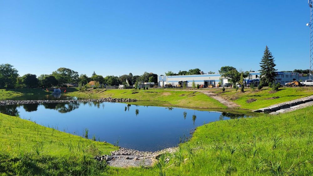 Our Retention Pond Maintenance service ensures your pond remains functional and visually appealing, preventing flooding with regular inspections, debris removal, and vegetation management for a healthier ecosystem in your landscape. for Galt Landscape Company in Canton, GA