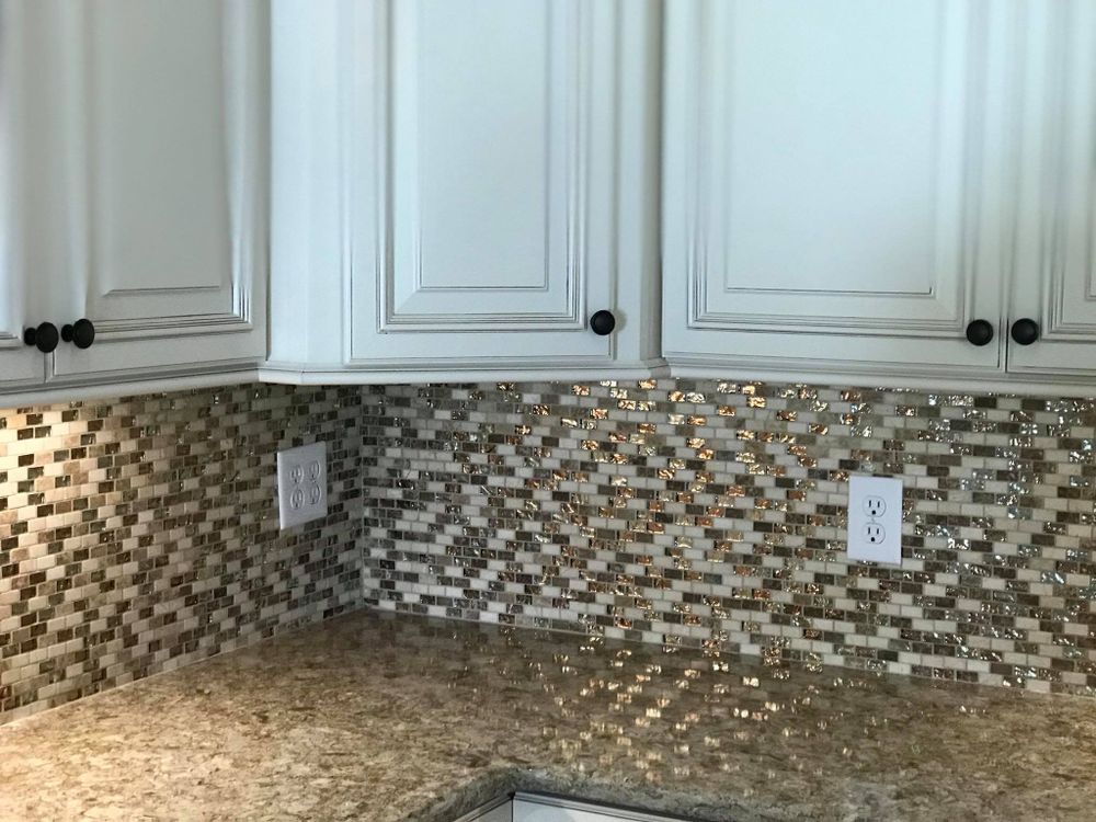 Our Mosaic Tiling service offers homeowners a unique and artistic way to enhance their living space with intricate patterns, vibrant colors, and durable materials for long-lasting beauty in any room. for Premier Floor Coverings in Myrtle Beach, SC