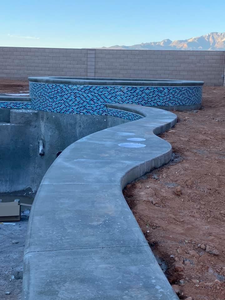 Enhance your pool's appearance and safety with our expert Pool Coping service, providing durable and stylish edges that protect against water damage while blending seamlessly with your outdoor aesthetic. for Gladiator Construction in St. George, UT