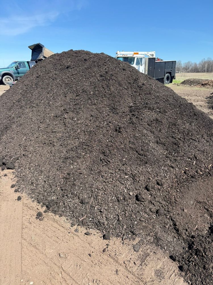Enhance your home's curb appeal with our Dyed Brow Mulch service, offering rich color and superior moisture retention for healthier plants. Enjoy a polished look that lasts through the seasons. Price = $30 per yard. Delivery price depending on the distance. for Panovich Landscape & Snow Removal LLC in Akron, OH