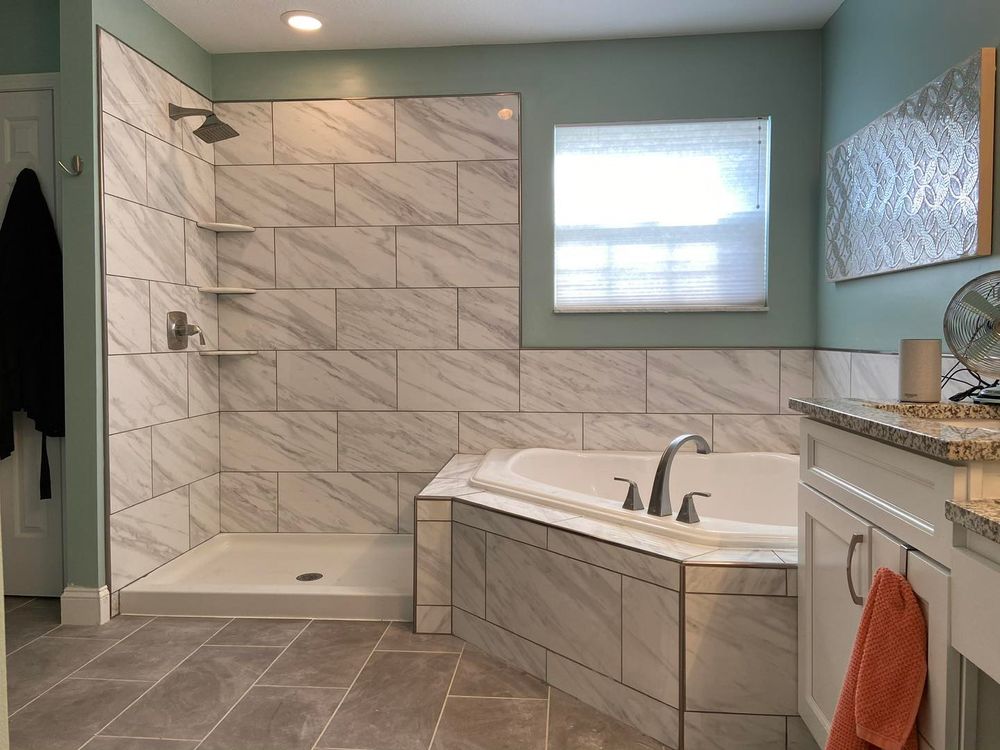 Transform your bathroom into a modern oasis with our expert renovation services, featuring high-quality materials, innovative designs, and skilled craftsmanship tailored to enhance comfort and functionality in every detail. for Father and Son Handyman in 44060, OH
