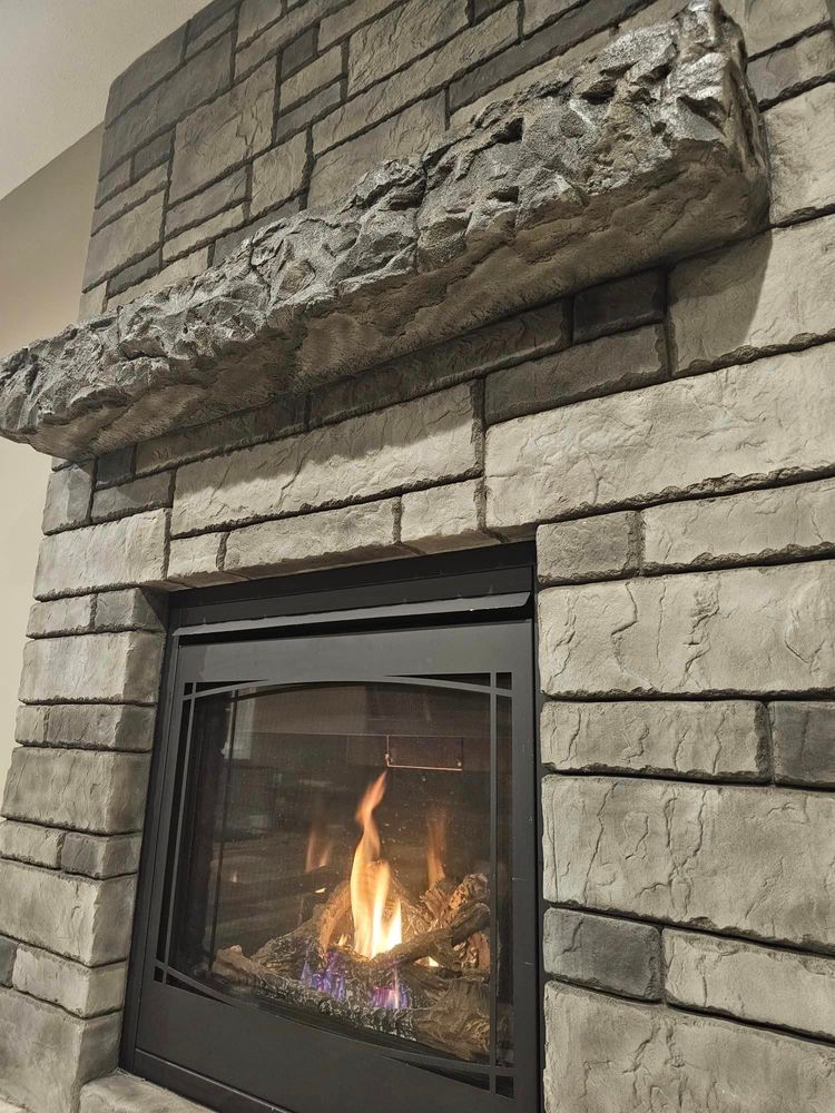 Interior fireplace & feature walls  for STAMPEDE Vertical Concrete in Isanti, Minnesota
