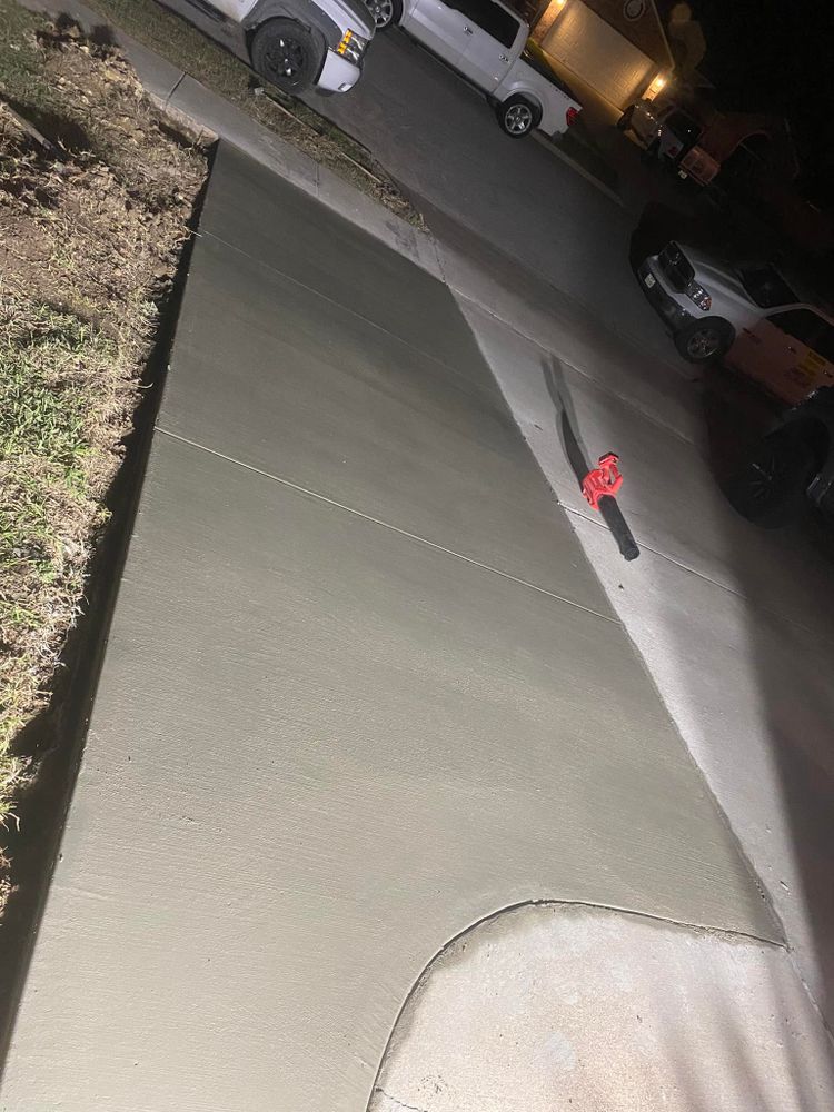 Our concrete company offers professional stamped concrete installation for homeowners looking to enhance their property with a durable and stylish driveway solution. Contact us today for expert services and exceptional results. for PC Concrete & Design in Austin, TX