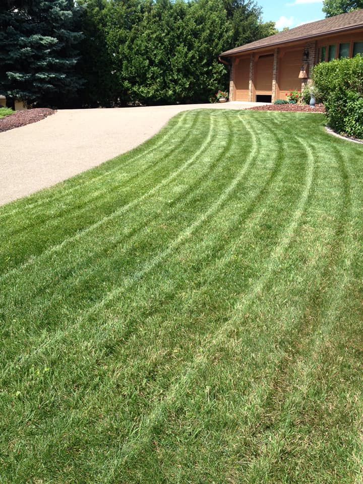 Lawn aeration is the process of perforating your lawn with small holes to allow air, water, and nutrients to penetrate the roots of grass for healthier and greener turf. for Keane Lawn Care & Snow Removal in Spring Lake Park, MN