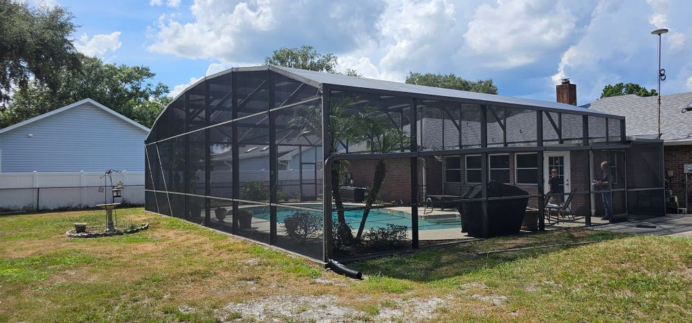 Enhance your outdoor living space with our custom pool enclosures, offering protection from debris and insects while adding style and value to your home for year-round enjoyment in a secure environment. for All Pro Screen in Central Florida, FL