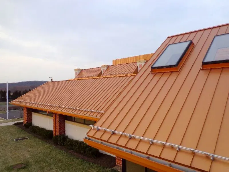Our metal roofing service offers homeowners durability and energy efficiency with a variety of stylish options. Trust our expert team for long-lasting protection and enhanced curb appeal for your home. for Shope Legacy Builders, LLC in Canton, NC