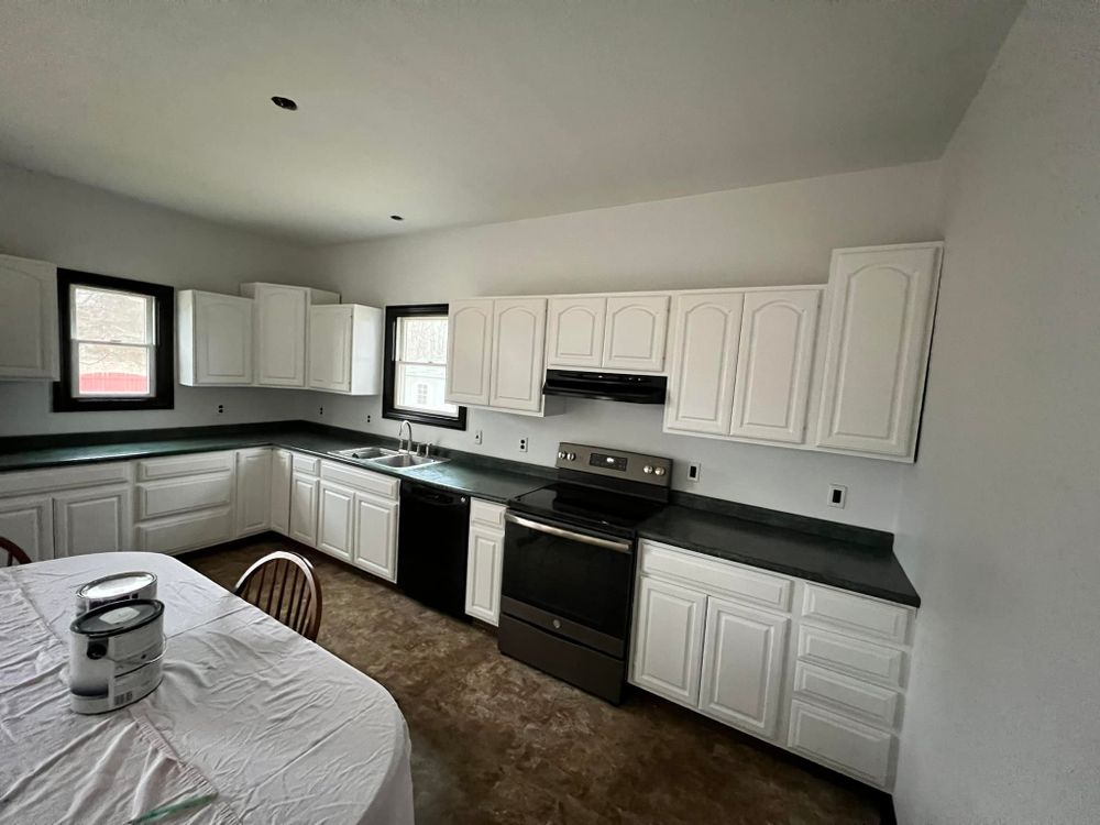 Transform your kitchen with our expert cabinet refinishing service. We revitalize existing cabinetry through meticulous painting and finishing techniques, enhancing aesthetics while maintaining durability for an updated, modern look at a fraction of the cost. for ZB Professional Painting in Flint,  MI