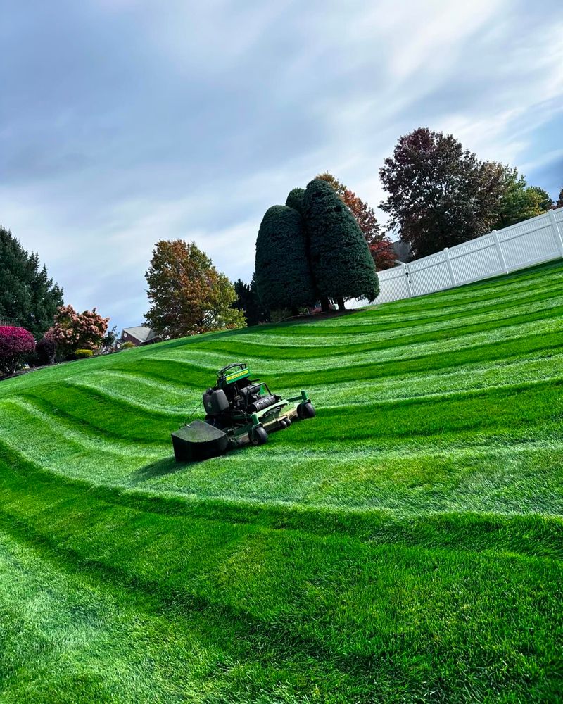 Our professional mowing service ensures your lawn is kept neat and healthy, enhancing the overall beauty of your property. Let us take care of the maintenance so you can enjoy your outdoor space. for 4 Brothers Landscaping LLC in Albany, NY