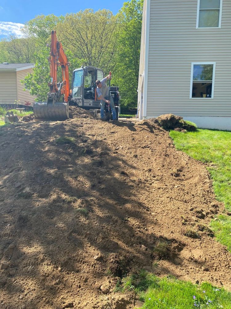 Our Residential & Commercial Excavation service offers reliable, professional site preparation, grading, and land clearing to ensure a solid foundation for any building project. Trust us for quality and timely results. for Davis Services  in Bethany, CT