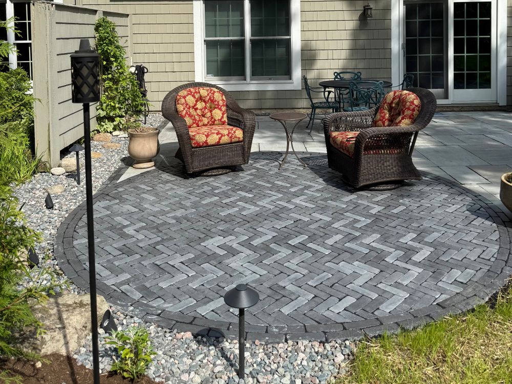 Enhance your home's exterior with our Outdoor Living Spaces Design service, creating customized, beautiful areas perfect for relaxation and entertaining while seamlessly integrating nature-inspired features into your backyard design. for Hillside Landscape & Design in Chesterland, OH