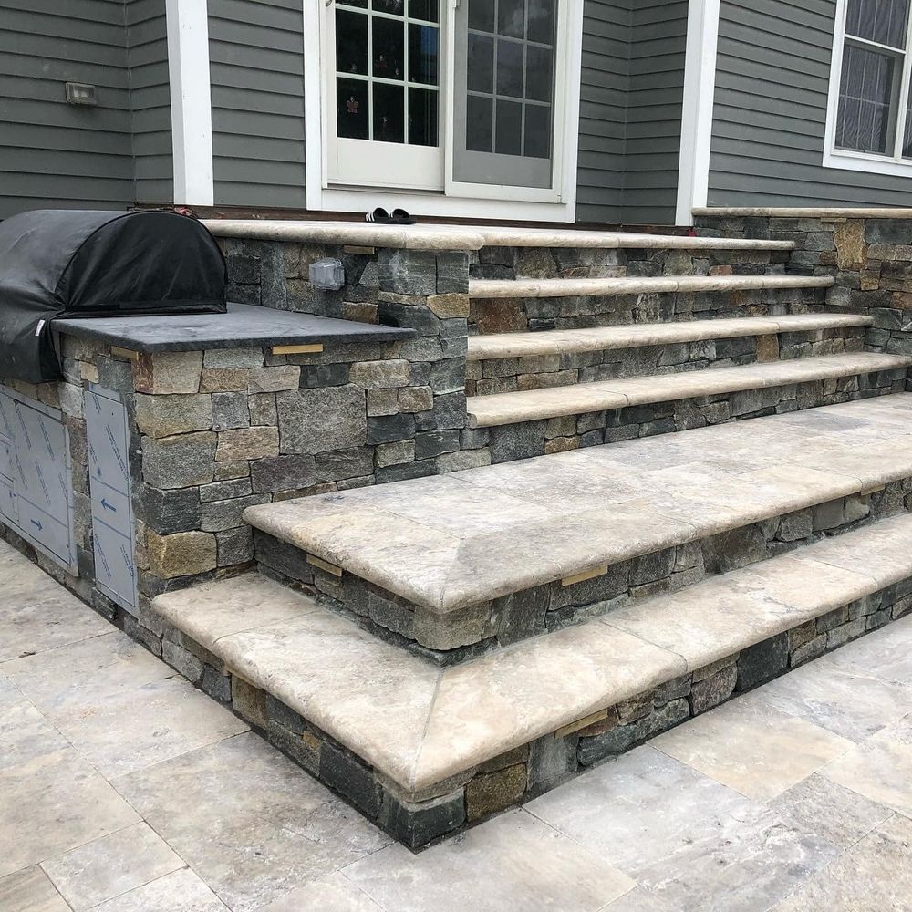 Transform your outdoor space with our expert Patio Design & Construction service. Our skilled masons will work closely with you to create a beautiful and functional patio that enhances your home. for Beavers Masonry & Foundation Repairs in Evanston, IL