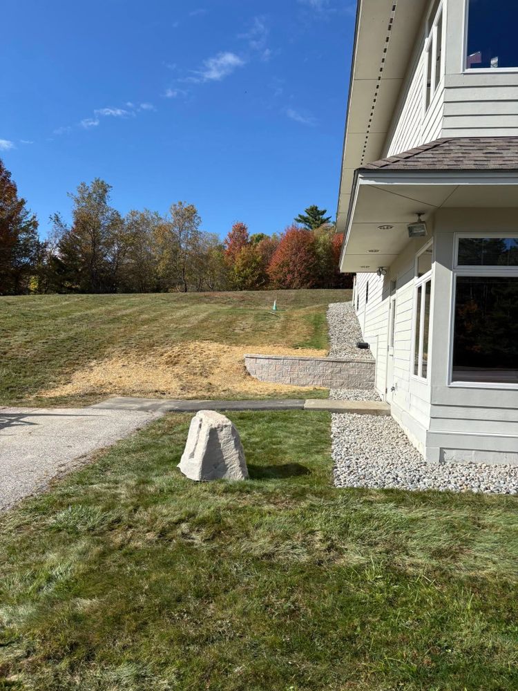 Our retaining wall construction service enhances your property's aesthetics and functionality, preventing soil erosion while creating beautiful landscape designs tailored to your vision and needs. Transform your outdoor space with expert craftsmanship today. for Thomas Clifford Property Services LLC in Enfield, NH