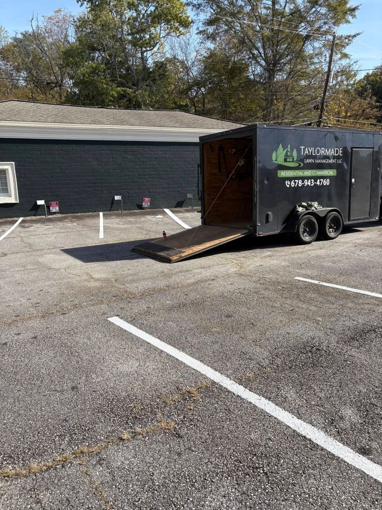 Enhance your property's safety and aesthetics with our professional parking lot striping service, providing clear, durable markings that optimize space and maintain a polished look for residential or commercial areas. for Taylormade Lawn Management in Clarkesville, GA