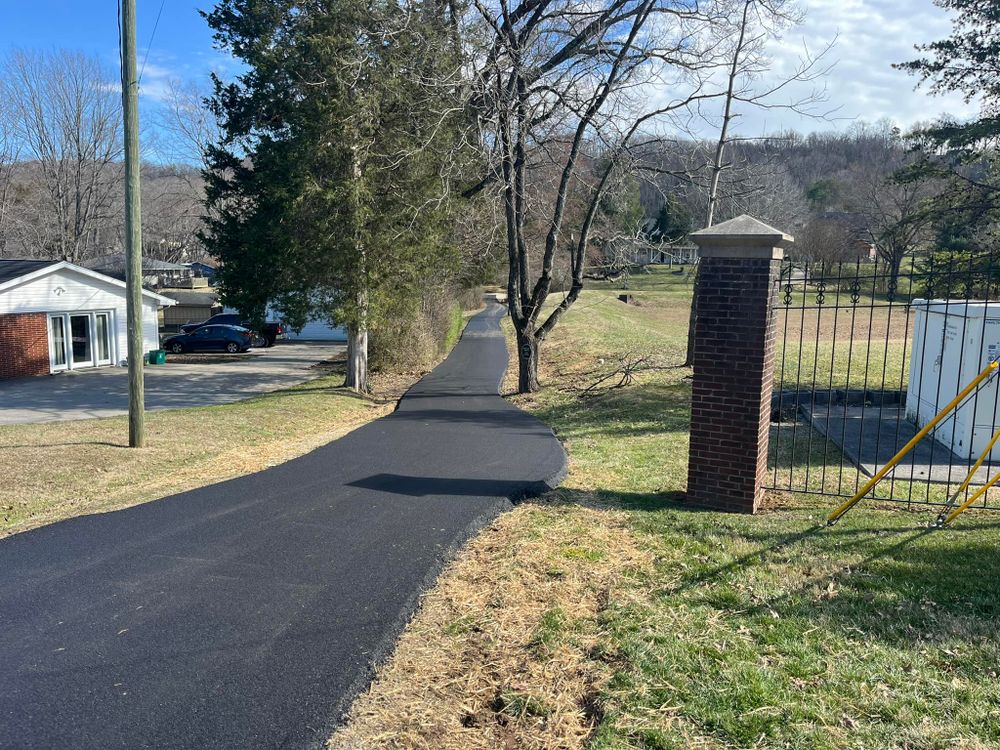 Transform your driveway with our professional paving service. We provide durable, high-quality asphalt solutions that enhance curb appeal and withstand the test of time, ensuring a smooth and attractive finish. for Quality Paving in Seymour, TN