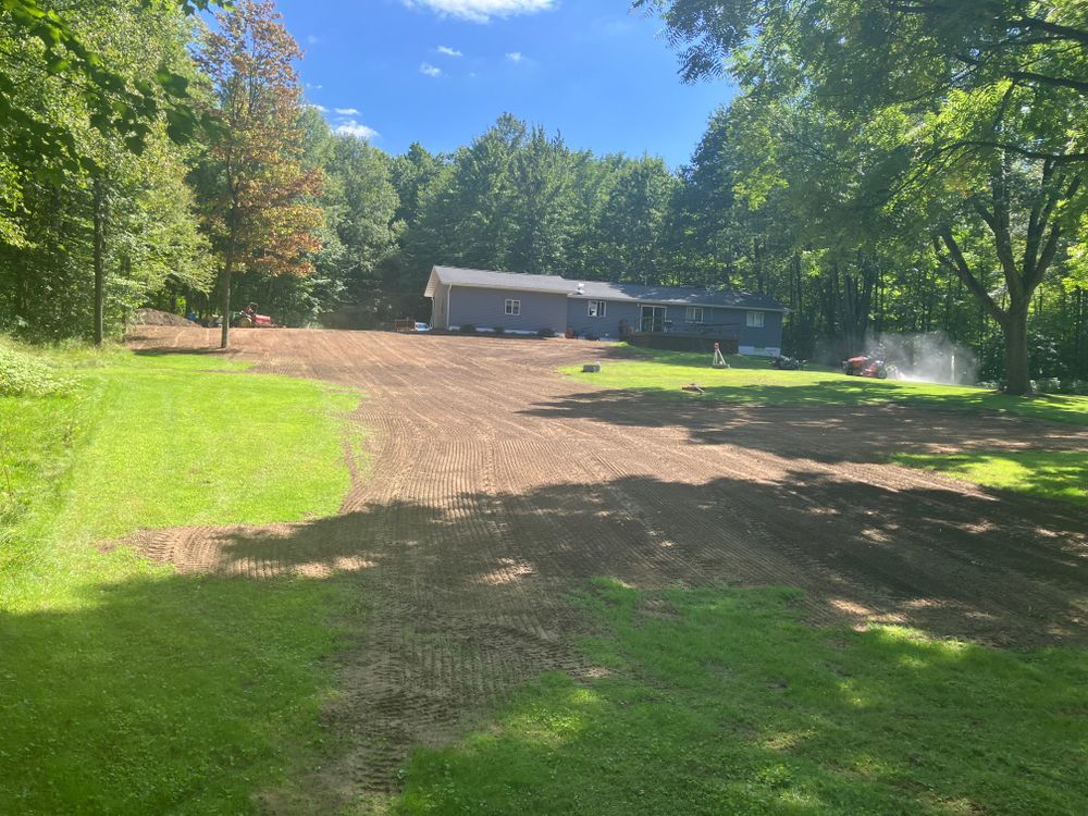 Our Dirt Work service expertly manages land clearing, grading, and excavation to create a solid foundation for your outdoor projects while ensuring minimal environmental impact and enhancing landscape health. for Brush Busters in Wausau, WI