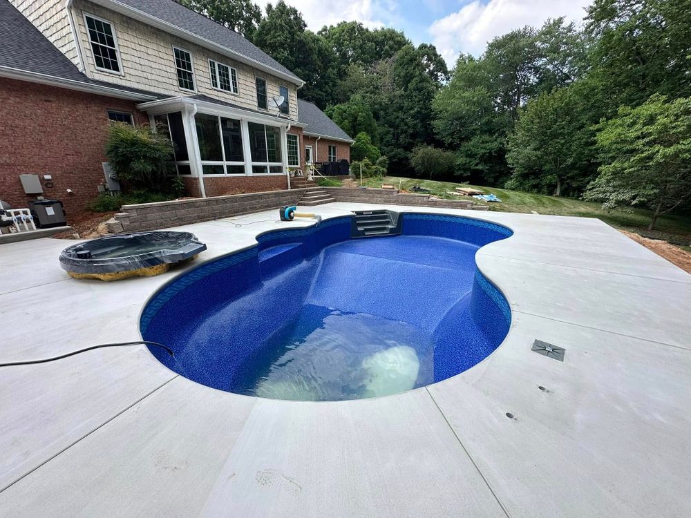 Transform your backyard with our expert pool concrete work services. We ensure durability, precision, and aesthetic appeal, crafting the perfect foundation for a stunning pool that complements your home's style. for ZRS Pools and Construction in Granite Falls, NC