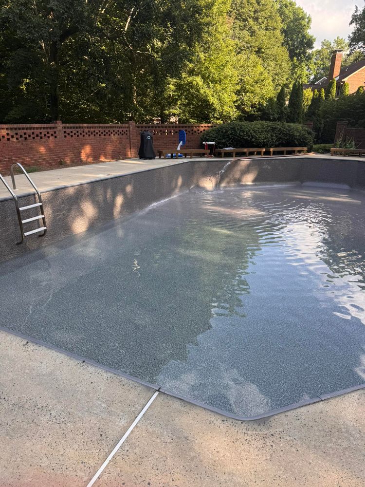 Transform your backyard with our expert inground swimming pool builds, offering custom designs and quality craftsmanship. Enjoy a personalized oasis that elevates your outdoor living experience and enhances property value. for Passmore Construction LLC in Dallas, NC