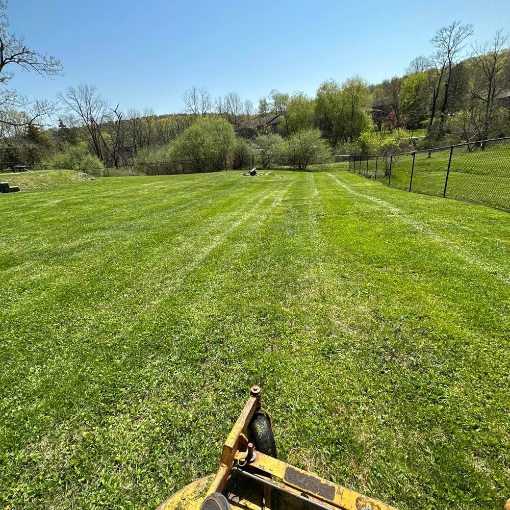 Our professional mowing service ensures a perfectly manicured lawn, enhancing your home's curb appeal with precision trimming and edging for a clean, vibrant, and healthy outdoor space you'll love year-round. for BW Outdoor Solutions in Newton, NJ