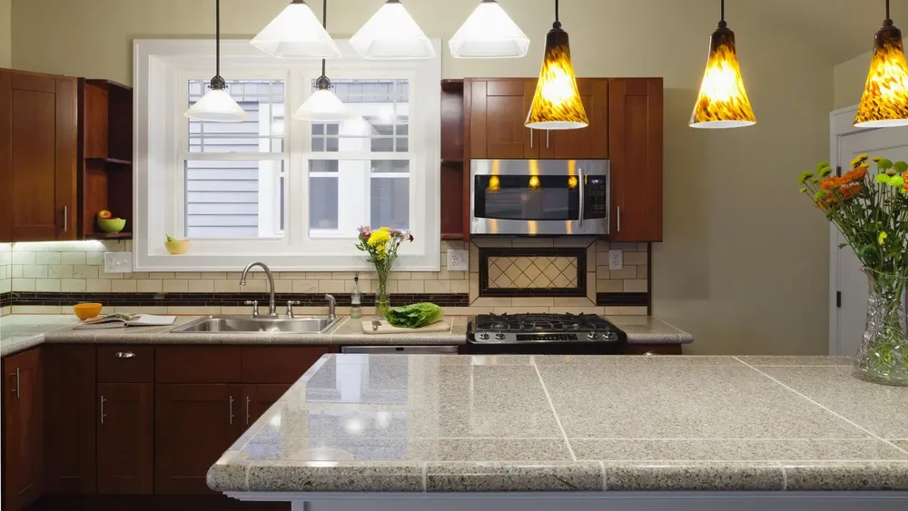 Transform your kitchen with our expert tile installation service. We offer durable and stylish tiles to enhance your countertop, providing a beautiful and functional upgrade for every culinary space. for Olympic Construction in Chandler, AZ