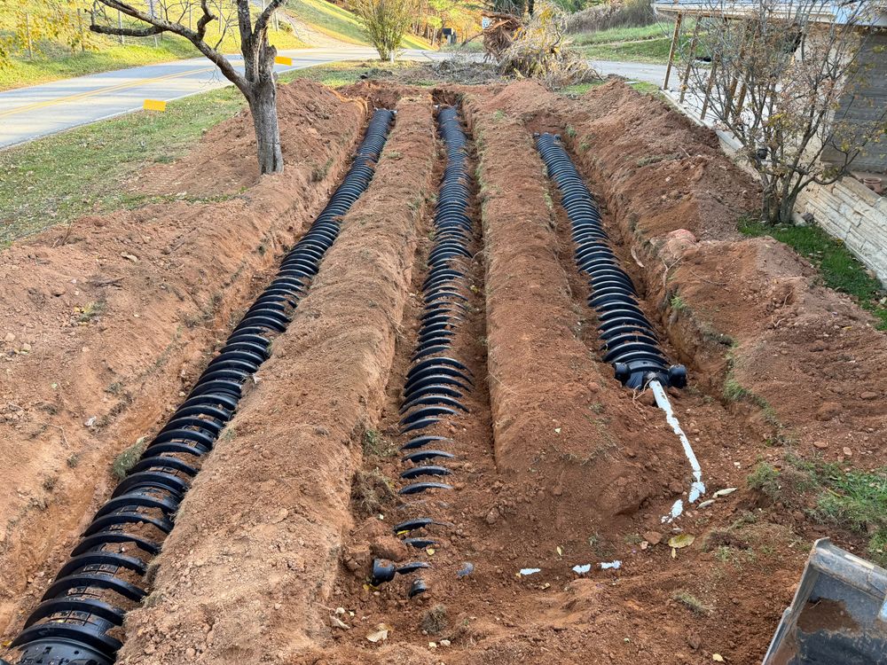 Our Sewer Line Repair service ensures efficient, reliable solutions to address blockages and damage, utilizing advanced techniques to restore functionality quickly, protecting your home from potential water damage and inconvenient disruptions. for Quality Land Management and Septic Service in Green Mountain, NC