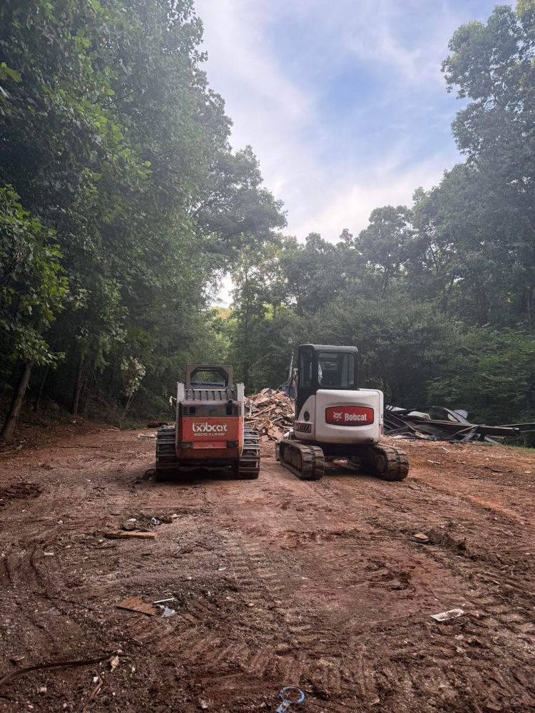 Our Skid Steer Work service provides precise grading, efficient land clearing, and quick earthmoving solutions to enhance your property's landscape, ensuring a seamless and professional experience for all your excavation needs. for S&S Excavation in Cleveland, TN