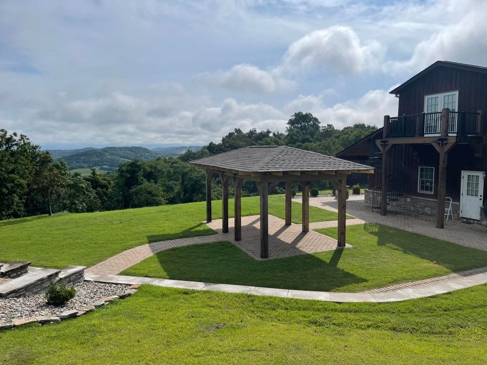 Our Outdoor Shelters service offers homeowners durable and stylish solutions for creating shade and protection in outdoor spaces, enhancing comfort, functionality, and enjoyment of the outdoors. for Mike Feagin Construction in Lewisburg, TN