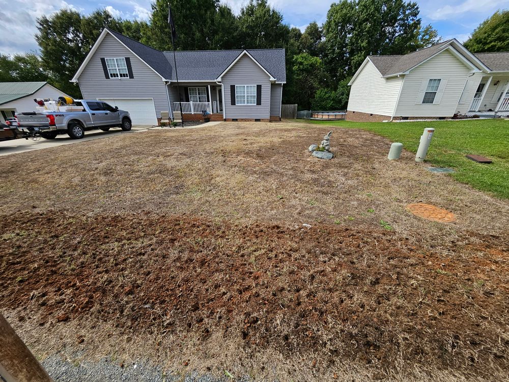 Our aeration services involve removing plugs of soil from your lawn to enhance water absorption and nutrient uptake, promoting healthy grass growth. Seeding follows to fill in bare areas for a lush lawn. for Gallimore’s Lawn Care in Thomasville, NC