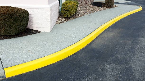 Enhance curb appeal and improve safety with our professional curb painting service, offering precise application for clear visibility of house numbers or street markers to ensure easy identification and navigation. for VenMor Asphalt Maintenance in Santa Paula, CA