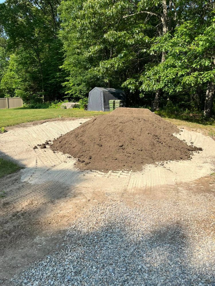 Our Material Hauling service ensures efficient and reliable transportation of soil, gravel, or debris for homeowners, facilitating smooth construction or landscaping projects with timely deliveries and experienced operators. for Ox County INC in Oxford, MA