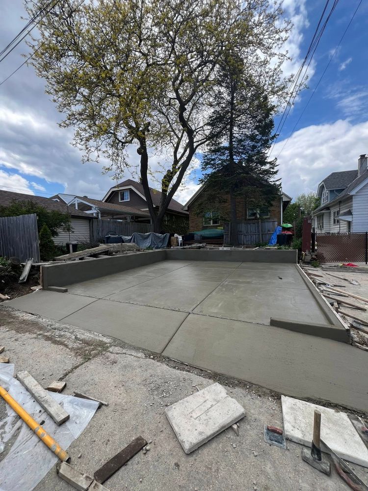 Enhance your outdoor living space with our expert Patio Design & Installation service, offering custom concrete solutions tailored to transform your backyard into a beautiful and functional retreat. for MKE Concrete Contractors LLC in Milwaukee, WI