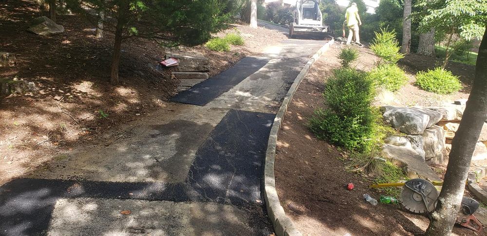 Our Patching service expertly repairs cracks and potholes, restoring the appearance and longevity of your asphalt surfaces, ensuring safe and smooth driveways or walkways for your home. for CJ's Paving and Sealcoating in Lynchburg, VA