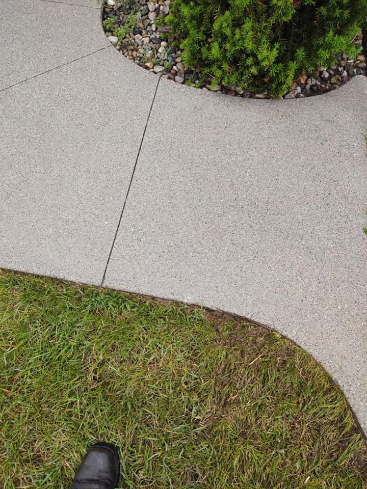 Enhance your home's curb appeal with our driveway and sidewalk cleaning service. Our expert team uses advanced pressure washing techniques to effectively remove dirt, grime, and stains for a pristine finish. for D & E Power Washing in Mt Pleasanr, MI