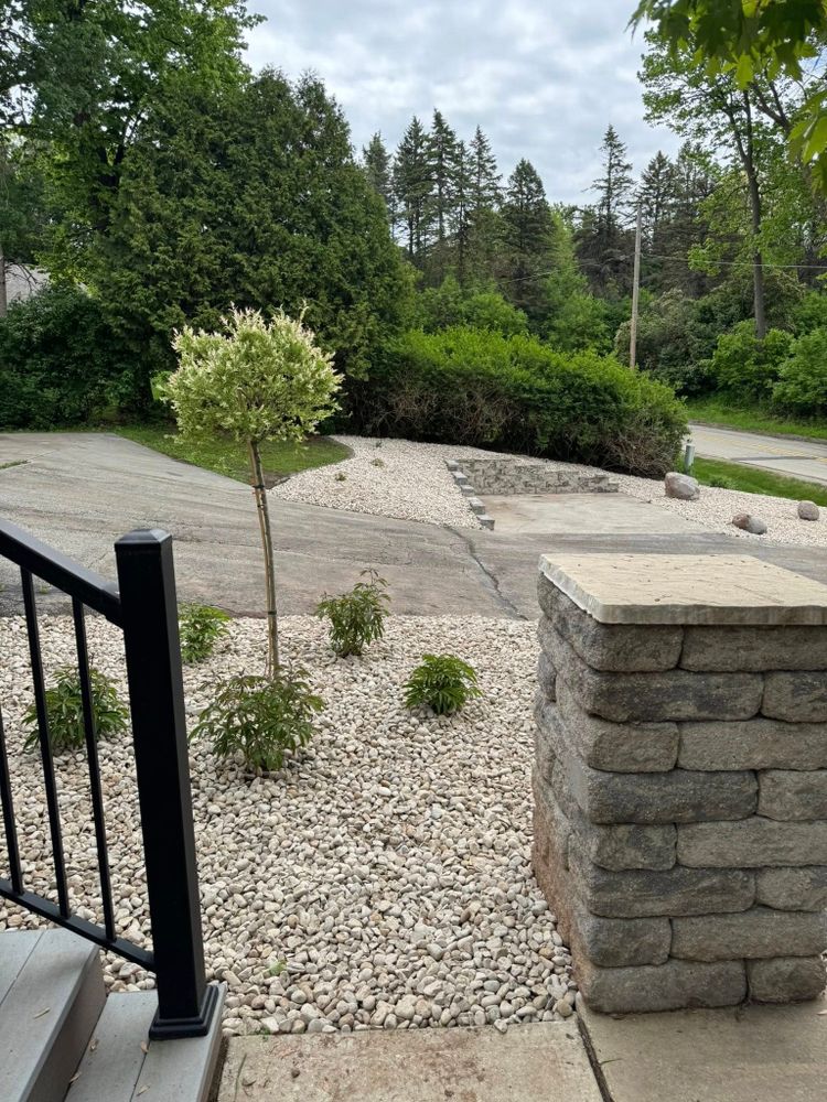 Enhance your home's curb appeal with our expert shrub trimming service, ensuring healthy growth and beautifully shaped plants that perfectly complement your landscape. Enjoy precision care for lush, vibrant greenery year-round. for Stitch's Landscape in Howard, WI
