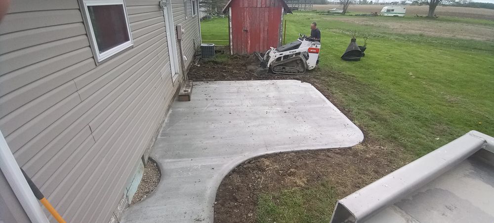 Our sidewalk installation services provide homeowners with durable, aesthetically pleasing walkways that enhance curb appeal and increase property value, ensuring a safe and beautiful path for your family and guests to enjoy. for Concrete Creations to Foundiations. in Yorktown, IN