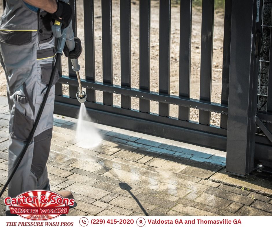 Revitalize your home's exterior with our professional driveway and sidewalk cleaning service, removing dirt, grime, and stains for a fresh and welcoming appearance using safe pressure washing techniques. for Carter & Son's Pressure Washing in Valdosta, GA