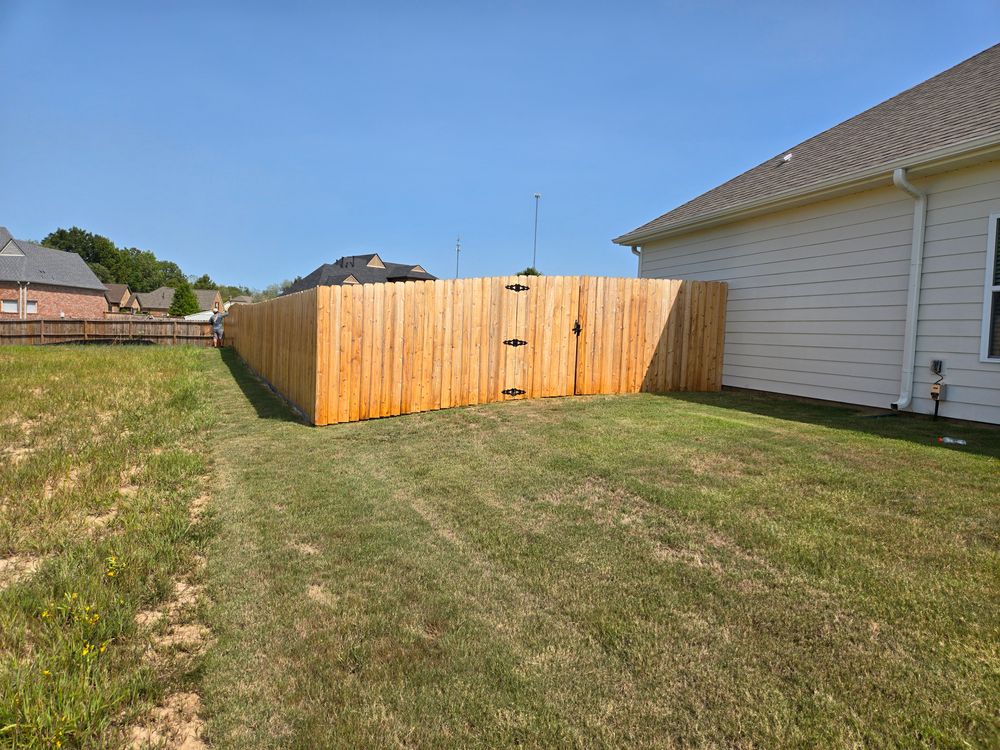 Fence staining for Patriot Fence  in Oakland, TN