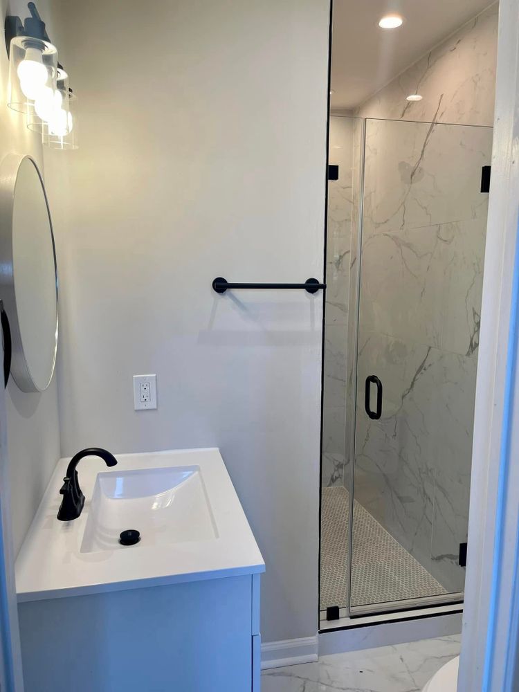 Transform your bathroom into a modern oasis with our expert renovation services. From design to installation, we ensure quality craftsmanship and attention to detail for a stunning, functional space. for Universal Builders in Baltimore, MD