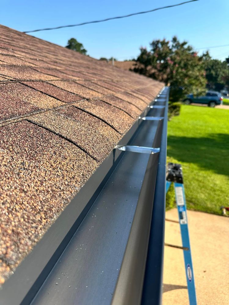 Our Gutter Cleaning service ensures your gutters are debris-free, preventing blockages and water damage. Enhance protection with the best gutter guards for long-lasting efficiency and peace of mind in maintaining your home. for Bobcat Gutters in Longview, TX