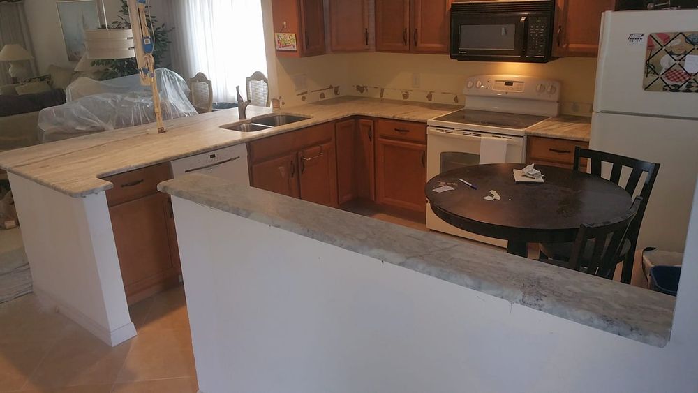 Our Kitchen Renovation service is designed to transform your outdated kitchen into a modern and functional space. From new cabinetry and countertops to updated appliances, we'll bring your dream kitchen to life. for Cobalt Construction Inc. in Cape Coral, FL