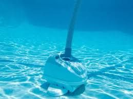 Our Vacuuming and Skimming service ensures a sparkling clean pool by thoroughly removing debris from the surface and bottom, maintaining clear water for safe and enjoyable swimming experiences. for Audley Enough Pool Service in Cape Coral, FL