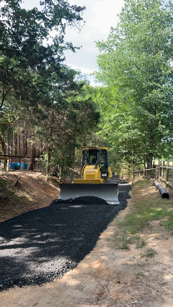 Our driveway construction service prepares, grades, and builds durable surfaces for lasting performance. From proper drainage to smooth access, we handle every step of your driveway installation professionally. for Hunt’s Hauling & Landworks LLC in Danville, VA