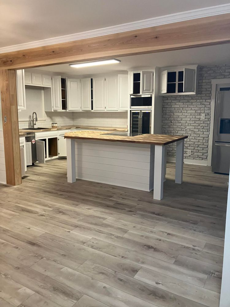 Transform your kitchen with our professional cabinet staining service. Searching for "cabinet refinishing near me"? Our experts revitalize your cabinets, enhancing beauty and longevity while fitting seamlessly into your home's decor. for Painting New Reborn in Rocky Point, NC