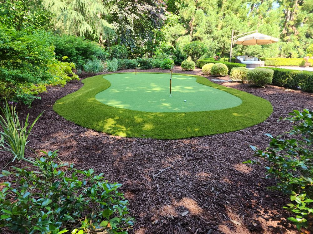 Enhance your garden with our professional Mulch Installation service, providing optimal moisture retention, weed control, and soil temperature regulation while adding aesthetic appeal to your landscape. Transform your outdoor space effortlessly today. for Elite Turfs in Mount Pleasant, NC